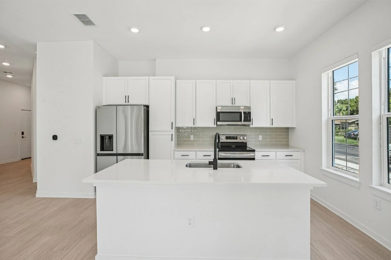 Kitchen with white cabinets